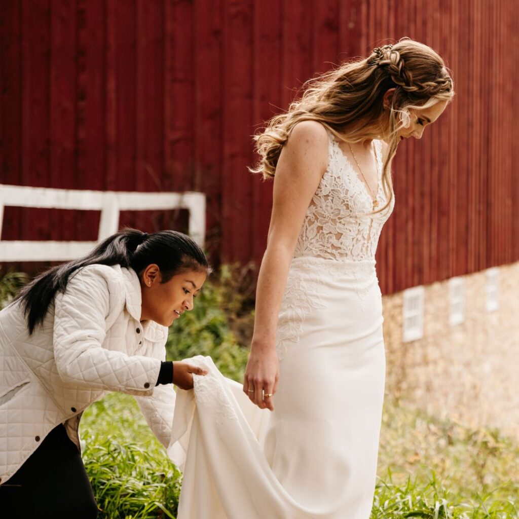 Ackin Events wedding coordinator assisting bride on wedding day in Minnesota